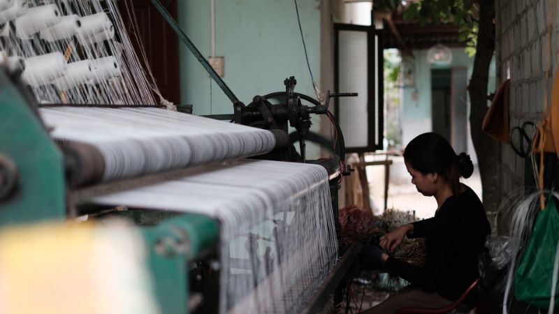 woman working at a loom